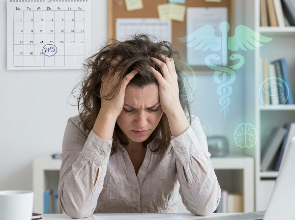 Женщина испытывает стресс и эмоциональное истощение на работе, связанное с тяжелым предменструальным синдромом. На заднем плане - символы медицины и психотерапии.